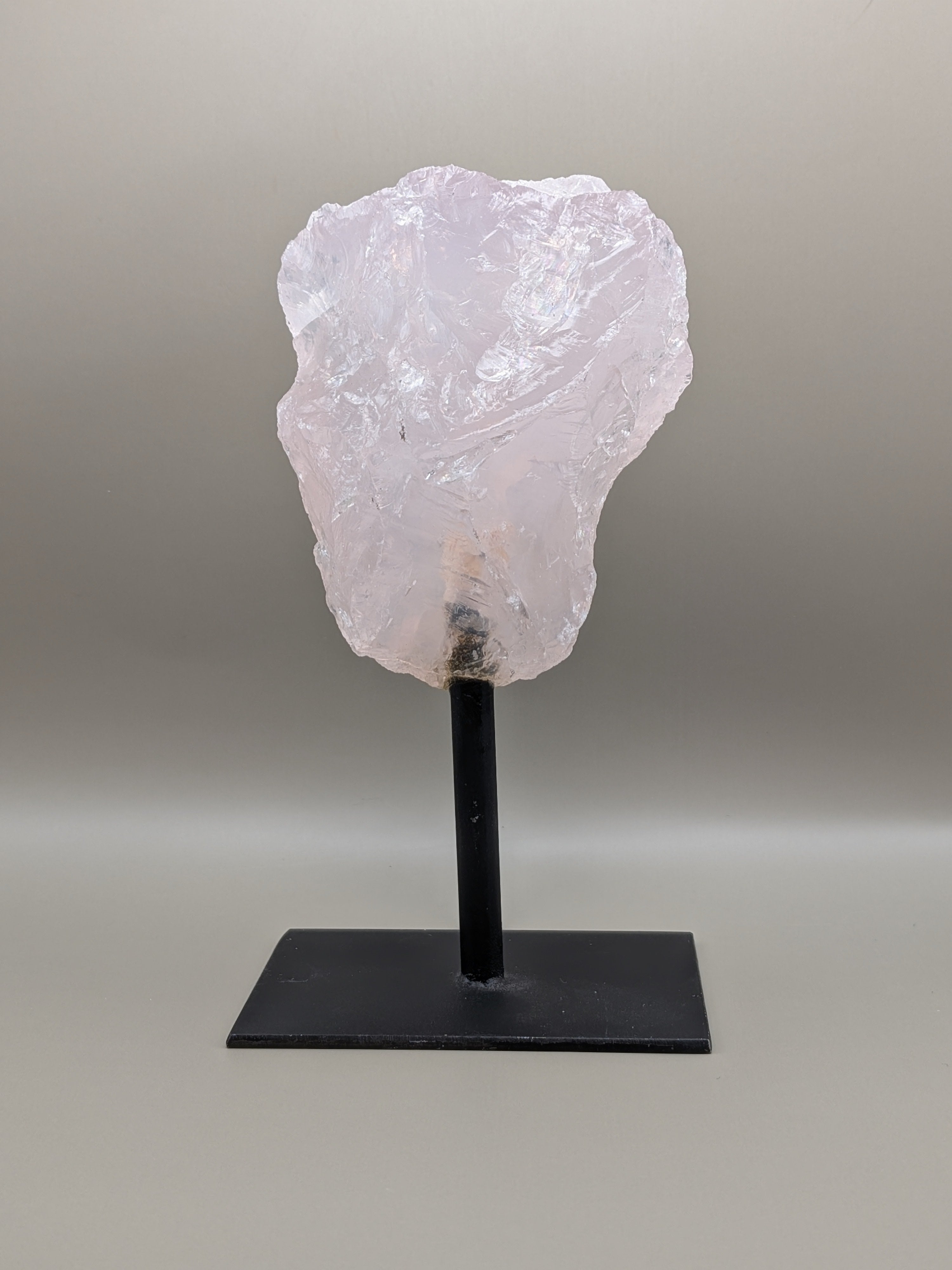 Rose Quartz Geode on a stand